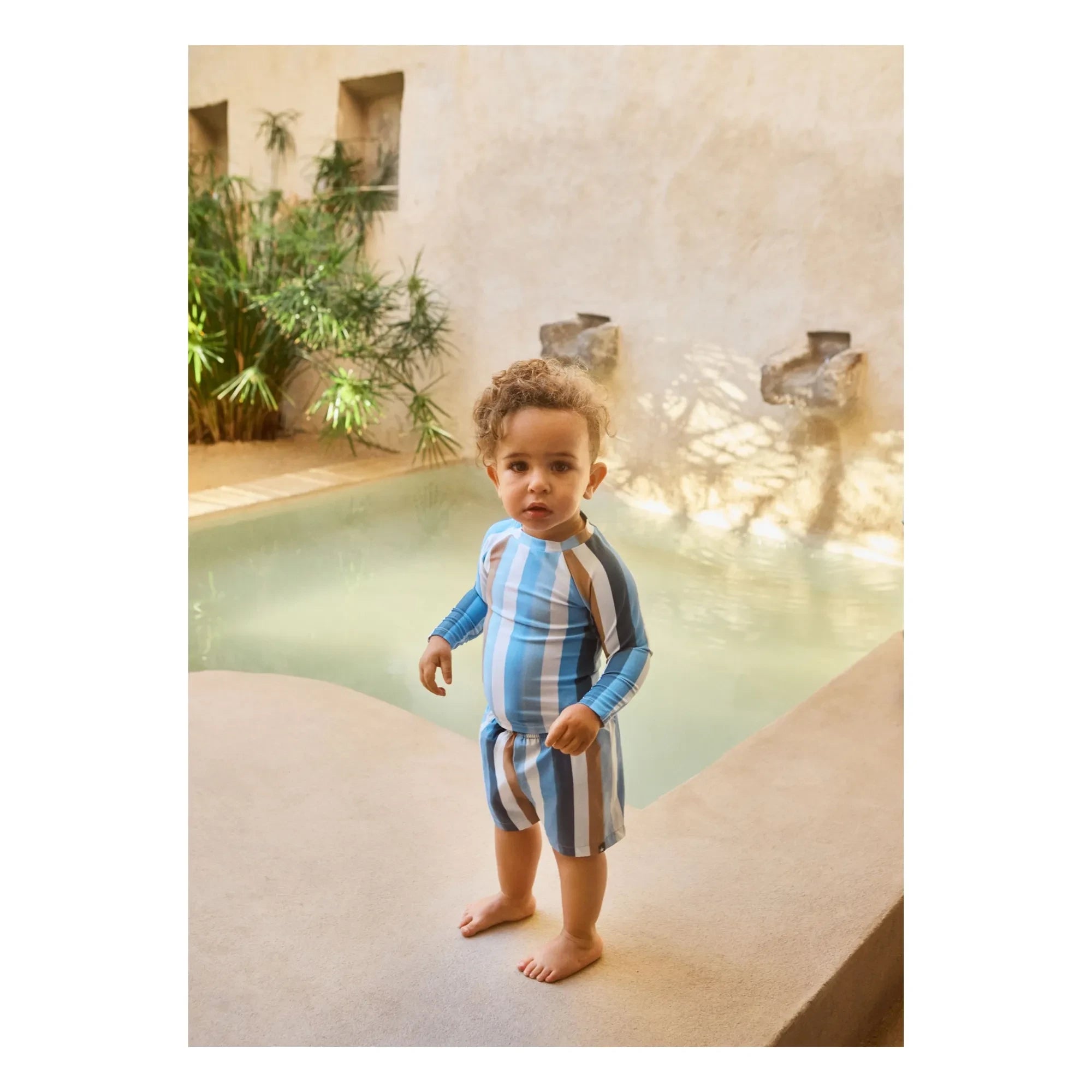 Molo - Newton Gestreifte Badeshorts aus recyceltem Material | Blau