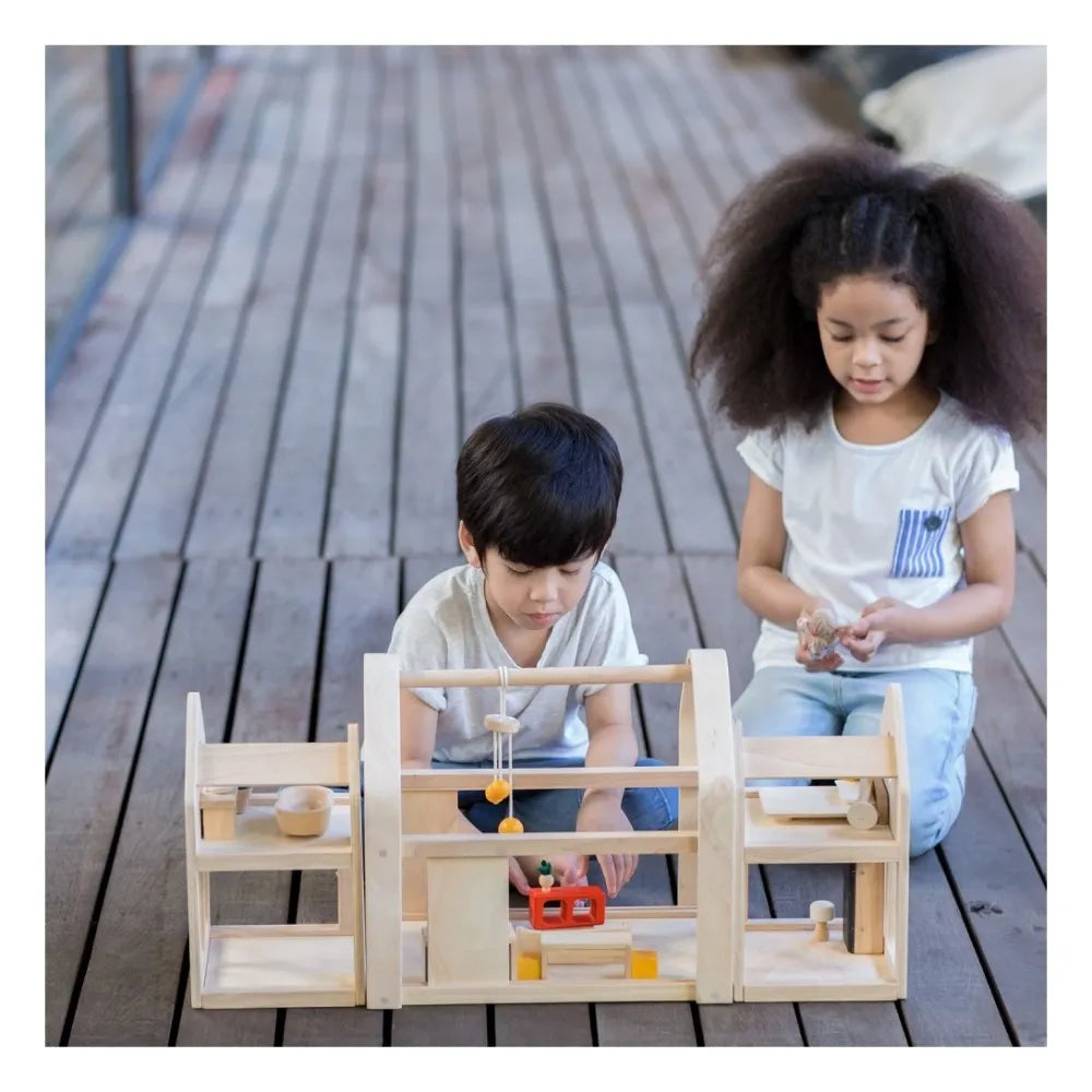 Plan Toys - Modulares 3-teiliges Holzhaus