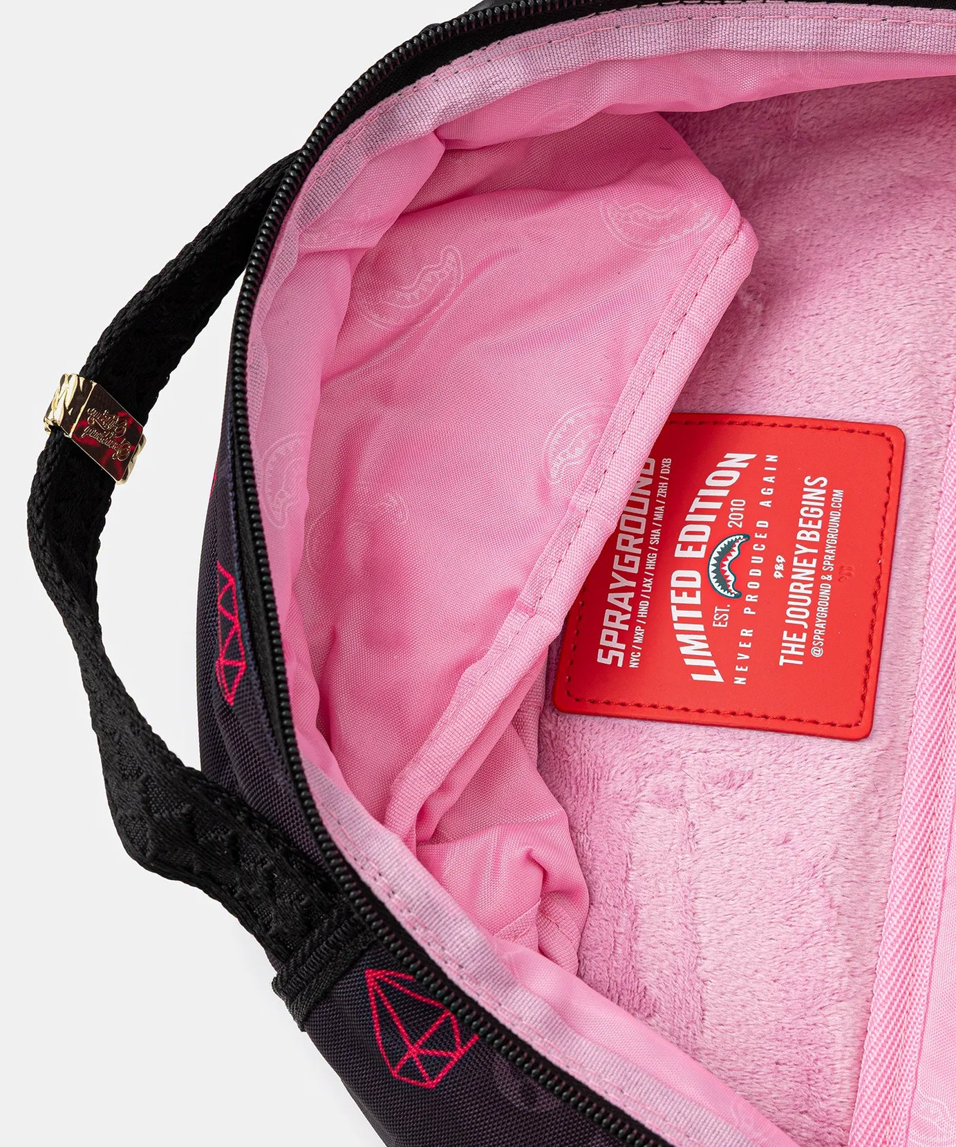 Sprayground - गुलाबी पैंथर पंजा निशान Dlxr पीठ बैग